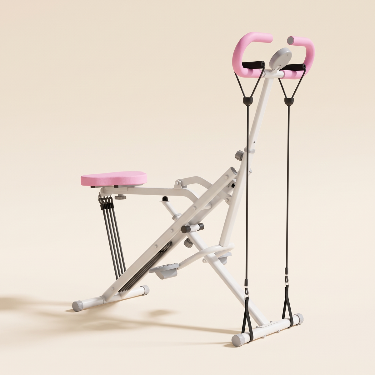 Foldable squat machine in pink with resistance cables on a cream studio background