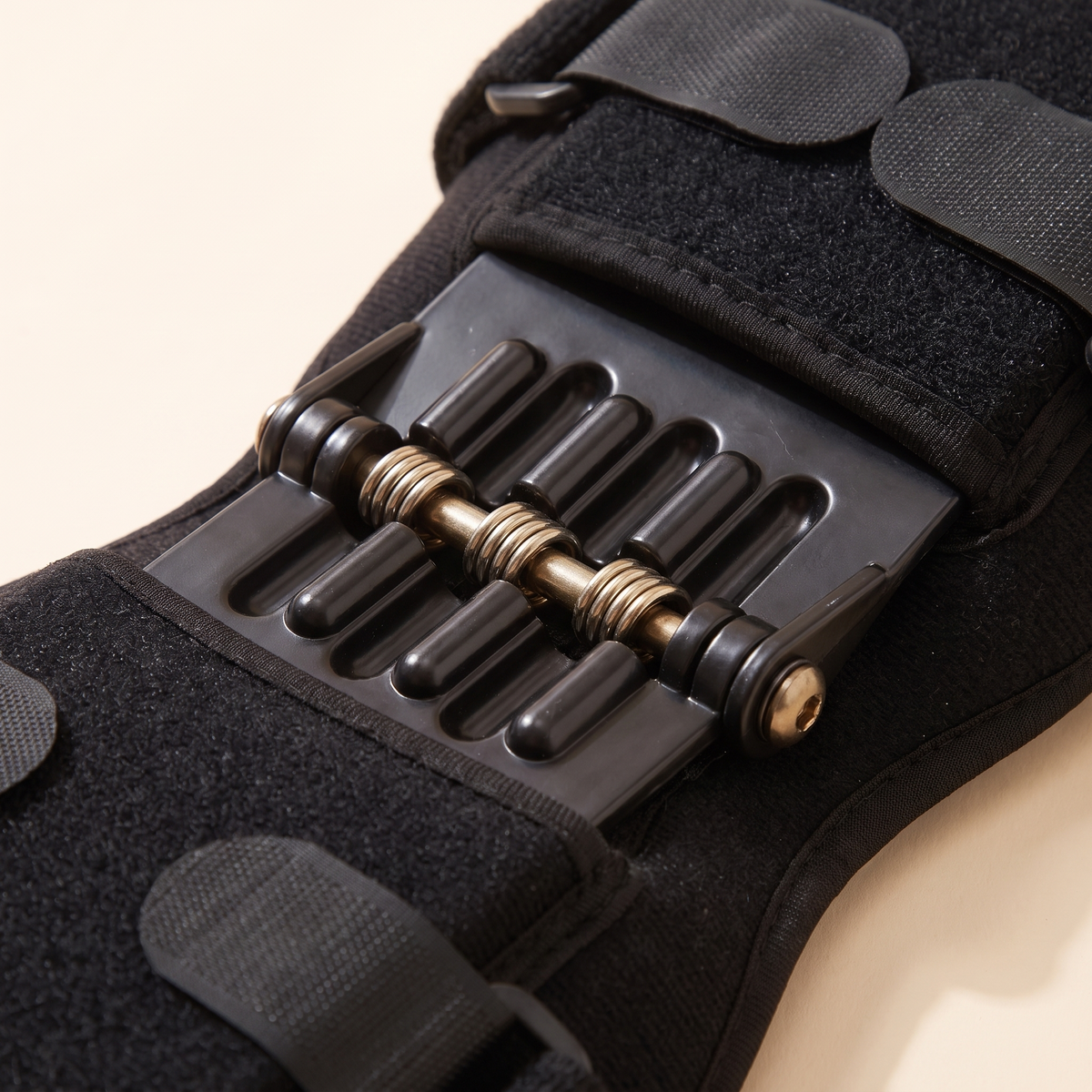 Close up of the spring stabilizers and hinge plates on the knee brace