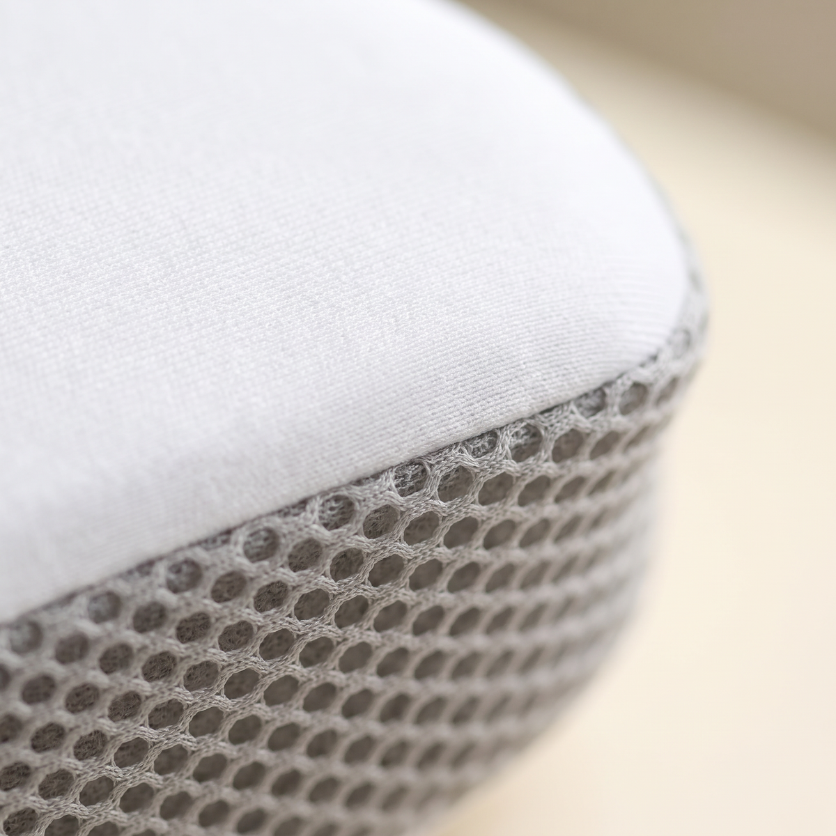 Macro close up of the smooth stretch cover and breathable honeycomb mesh on the Ultra pillow