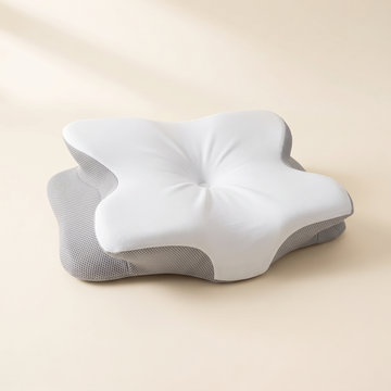 Ultra contour memory foam pillow in gray with a smooth white stretch cover and gray mesh base