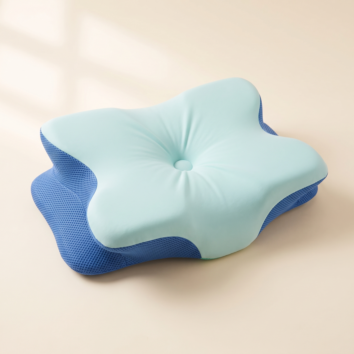 Ultra contour memory foam pillow in blue with a pale aqua stretch cover and cobalt mesh base